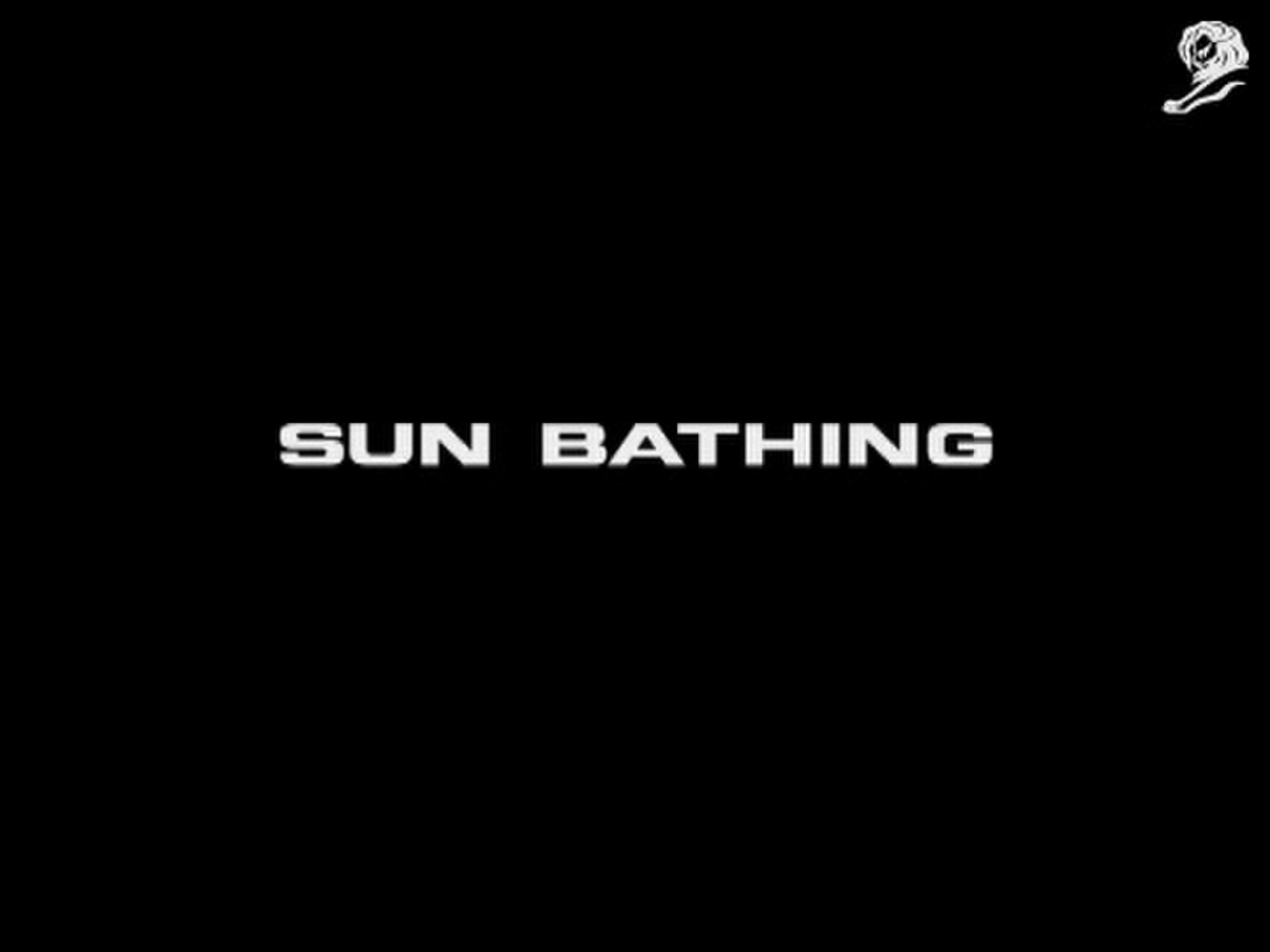 SUN BATHING